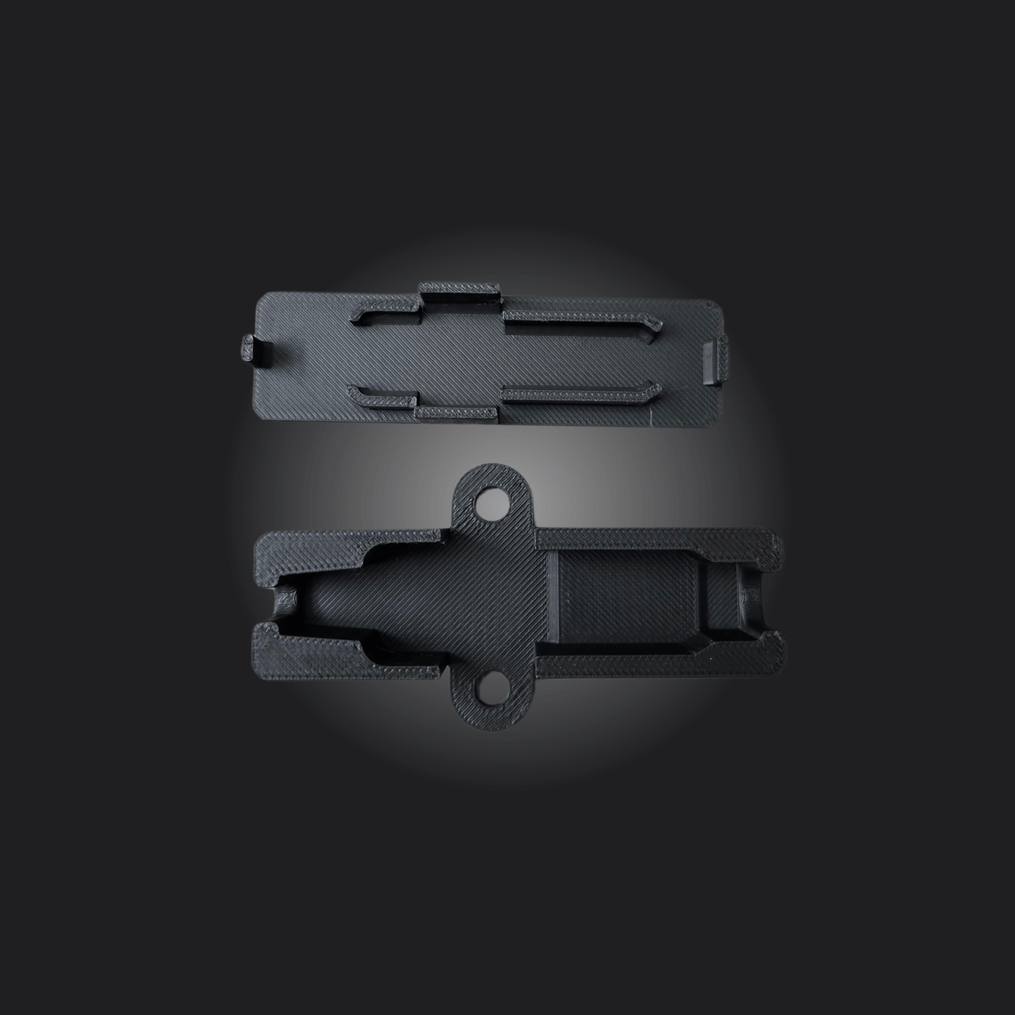 Simagic Link Enclosure top and bottom view, designed to secure USB connections during racing.