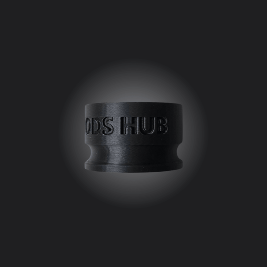 Close-up of a black gaming wheel hub, prominently displaying 'HODS HUB' for enhanced racing simulation performance.
