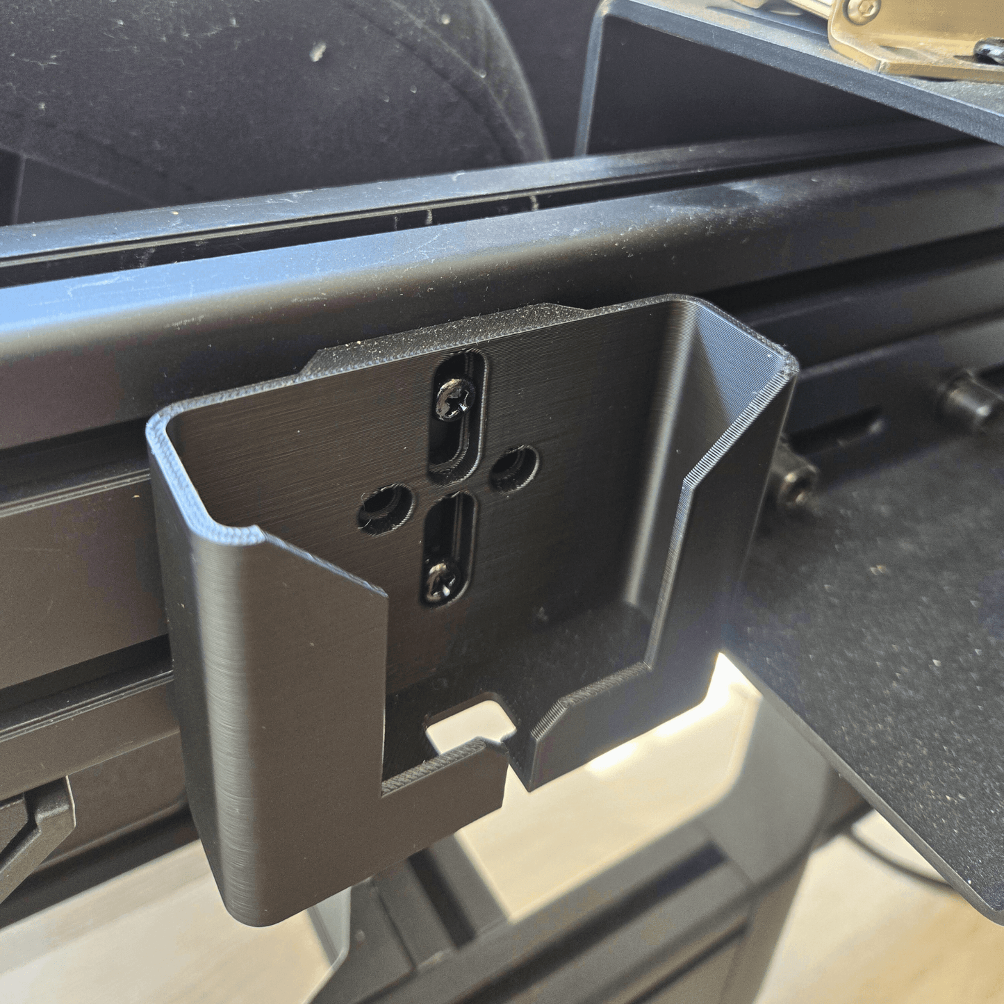 Phone Holder for Sim Rigs mounted on a sim racing rig for secure phone placement during racing sessions.