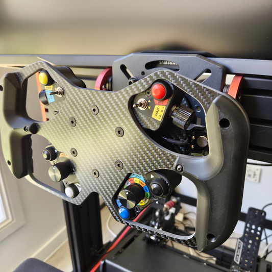 Close-up view of the Formula Wheel Hub showcasing buttons and ergonomic design for sim racing.