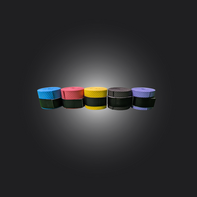 Five handle grips in various colors for sim racing wheels, showcasing customizable options for improved comfort.